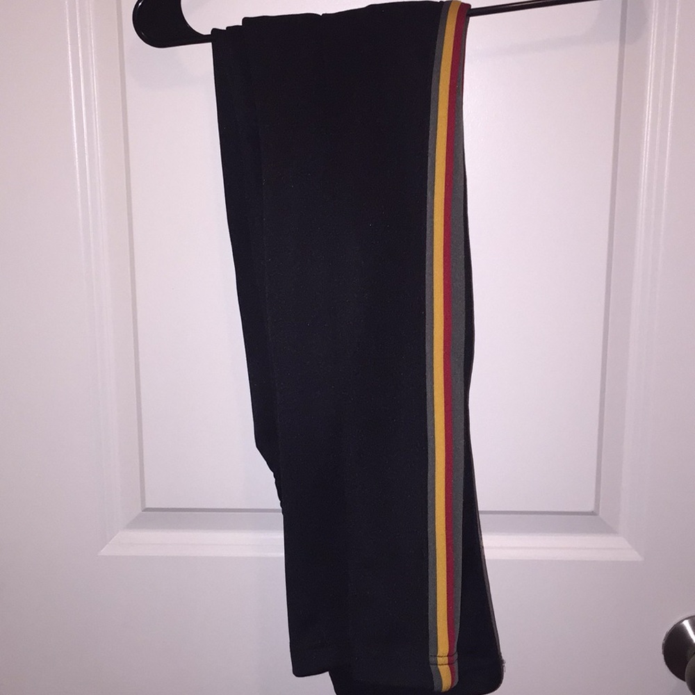 Side strip track pants men’s size small.